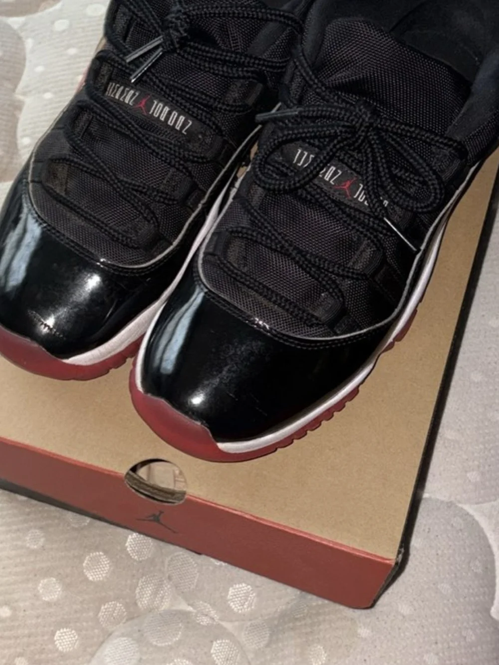 Black & Red Men’s Low-Top Jordan's 11 Athletic Sneakers